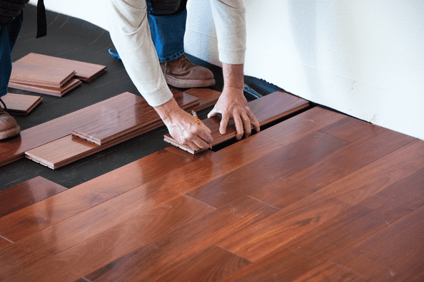 Professional flooring installation with hardwood panels in Calgary